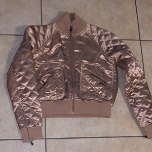 bebe Shiny Quilted Bomber Jacket in Bronze